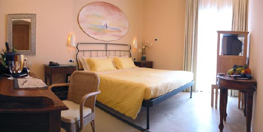 Отель Tombolo Talasso Resort 5*, Италия